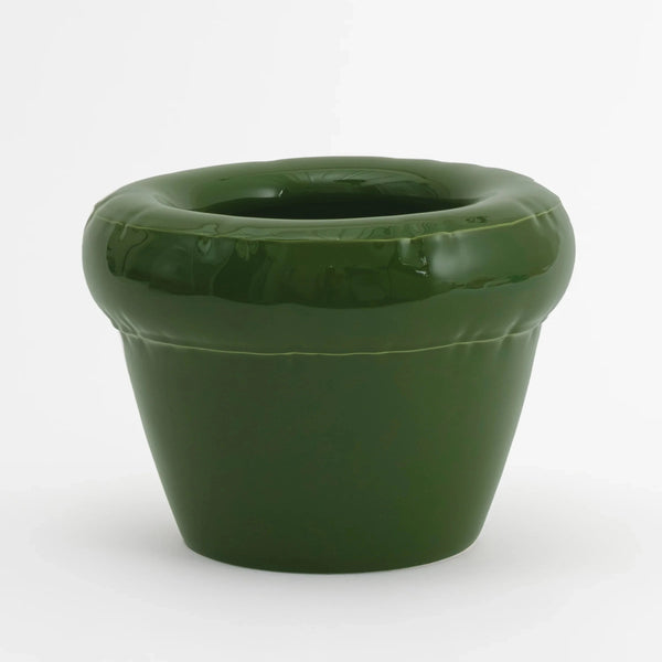 Pot vert sur fond blanc